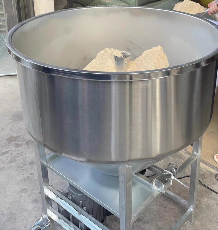 What is the purpose of a stainless steel feed mixer?